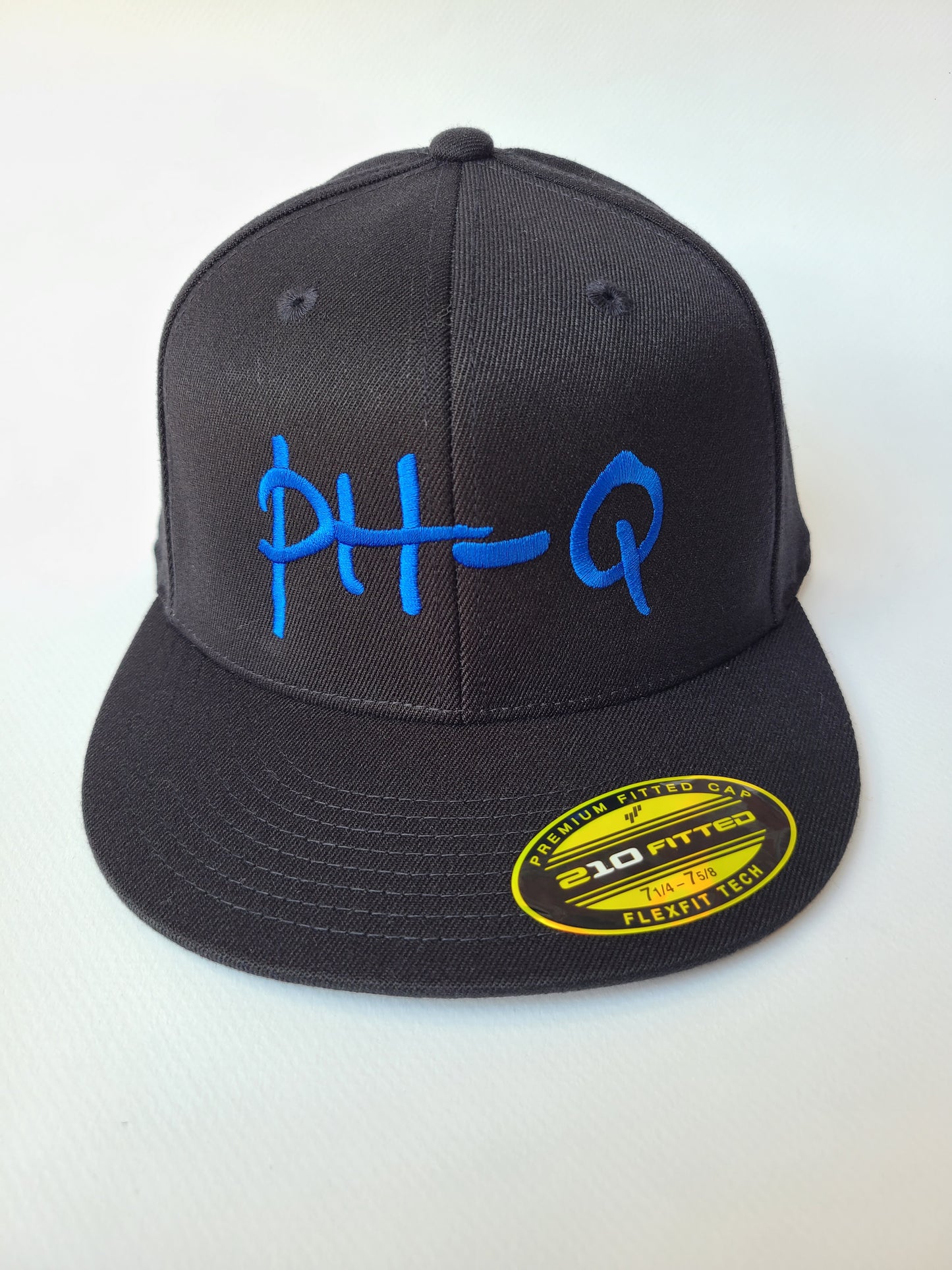 Flexfit 210 Black w/ Large Blue Letters
